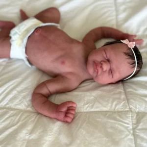 Full body therapeutic newborn doll in Europe, 19 inches long and 7 lbs, designed for emotional support and comfort.