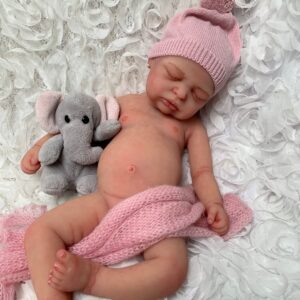 Therapeutic baby doll in Europe made from full body platinum silicone with realistic newborn features and calming sleeping pose.